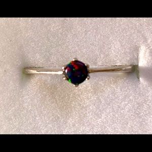 Sterling silver and lab created black opal ring. Size 9.